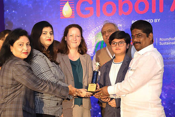 Mrs. Archana Kute receving Globoil Asia Emerging Company Of The Year 2020 Award for Tirumalla Oil Refinery